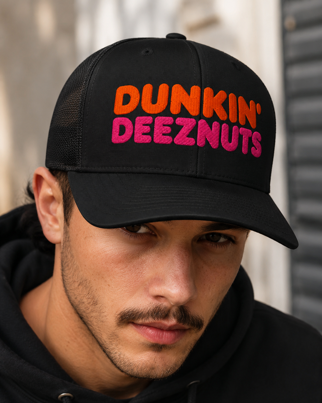 Dunkin Deeznuts funny embroidered trucker cap design close-up